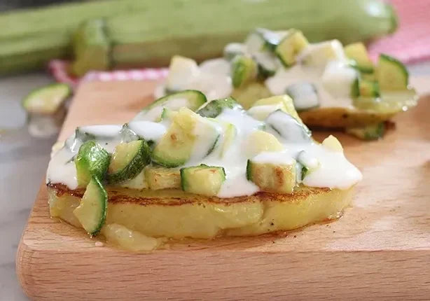 Potato croutons with courgette and stracchino