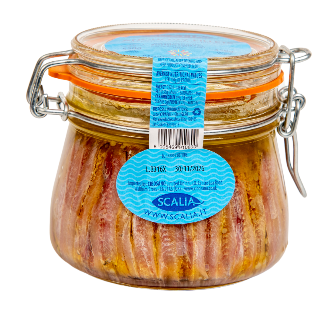 Glass jar of anchovy fillets with metal clasp and blue label, packed in oil