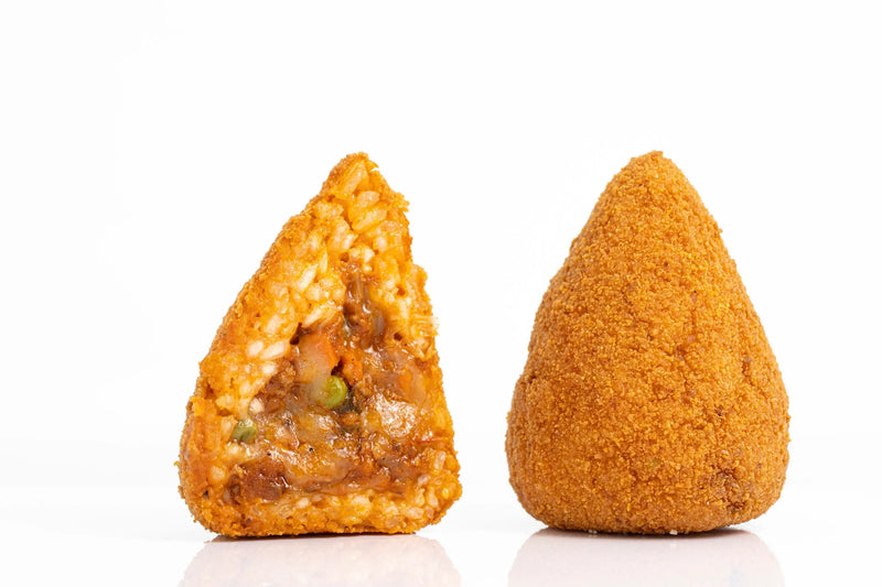 Sicilian arancini with ragù filling, triangular fried rice ball
