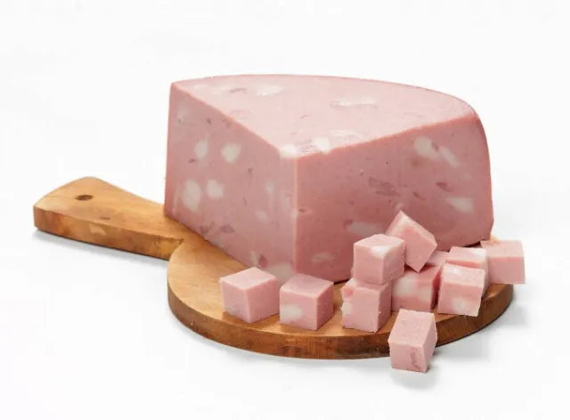 Mortadella sausage loaf with sliced cubes on a wooden serving board