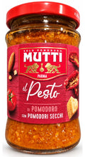 Mutti pesto jar with red label il Pesto and dried tomato pieces
