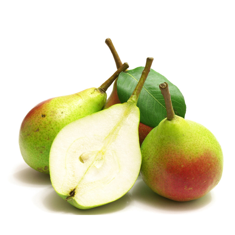 Fresh pears, green-yellow with one sliced half and leaf